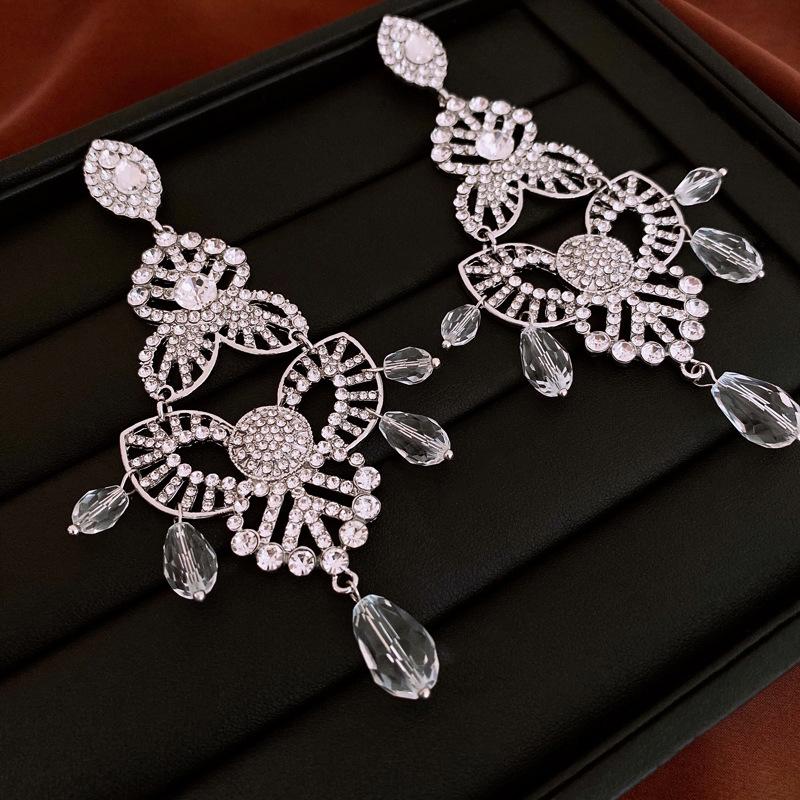 

Цветочные серьги-капли с кристаллами и стразами для женщин, модные, легкая роскошь, преувеличенные, Европа и Соединенные Штаты, циркон