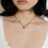 geegee smoky drop string necklace