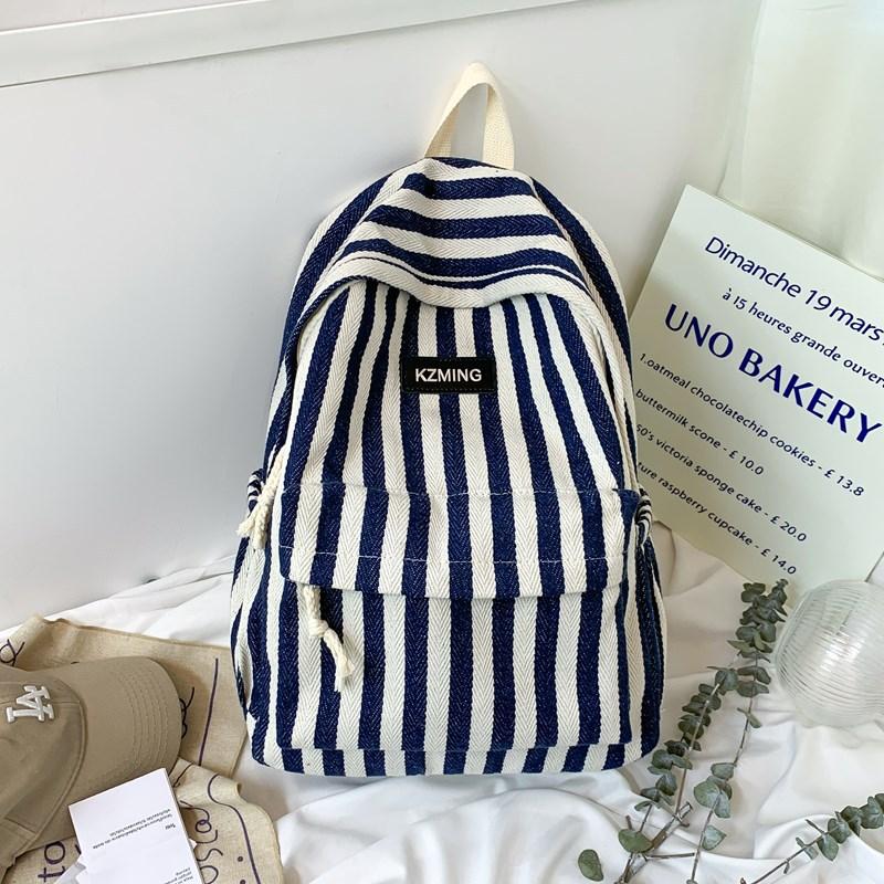 High-value college style striped backpack for junior high school students, casual, simple, lightweight and large-capacity backpack.