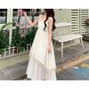 Japanese temperament fringed big pendulum medium and long dress new waist and thin holiday style super fairy sleeveless white polyester