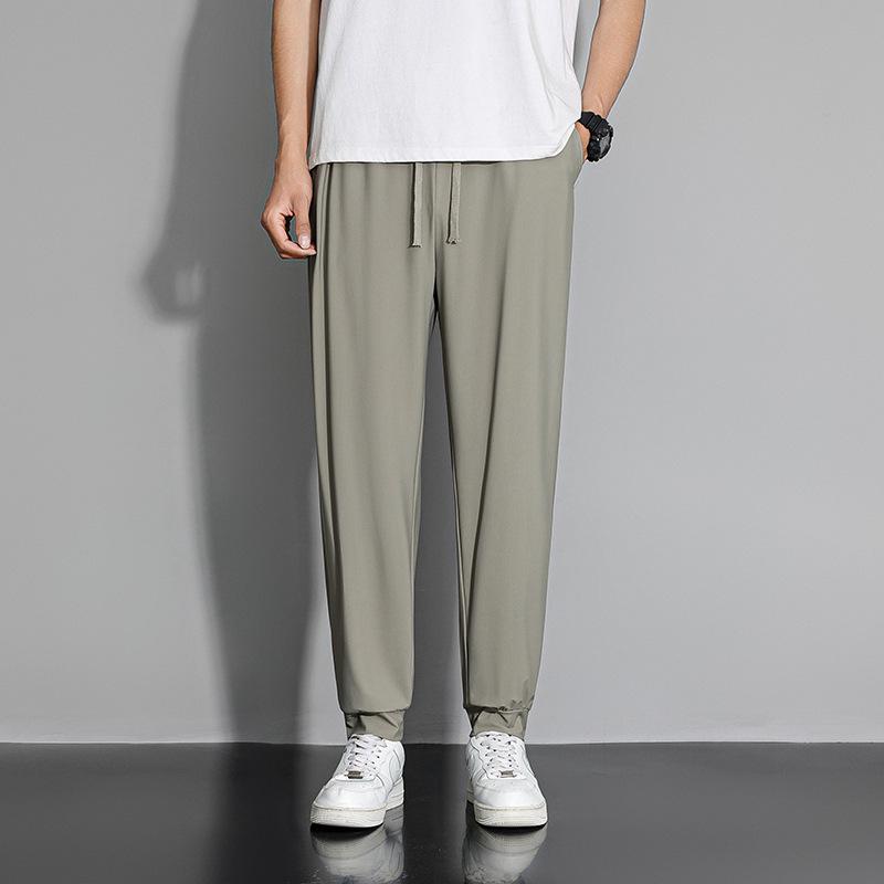 Summer Ice Silk Quick-Dry Joggers: Breathable, Stretchy, Long Pants for Men & Women - Ideal for Casual Sports.