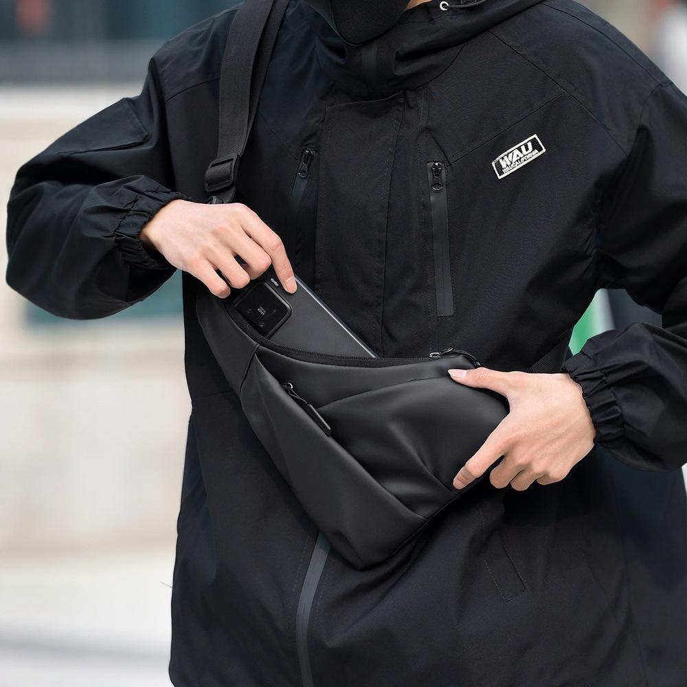 New triangle bag casual men's leather film large capacity messenger bag fashionable outdoor water-proof shoulder bag