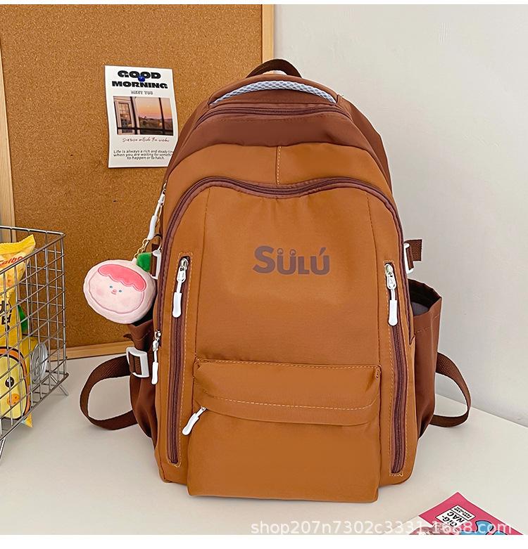 Schoolbag schoolbag female ins high value large capacity junior high school student backpack Japanese simple contrasting color backpack wholesale