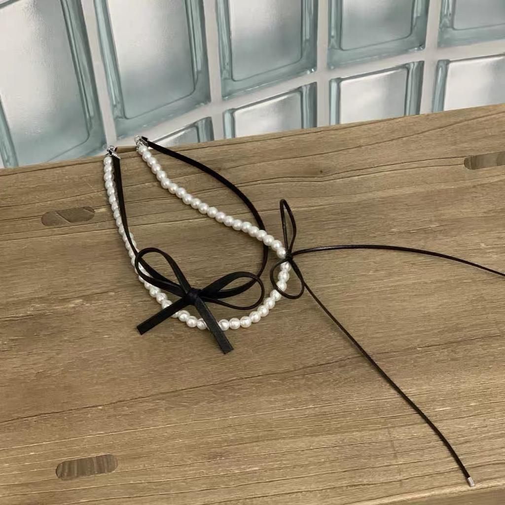 Temperament Double-layer Pearl Leather Butterfly Collar Necklace Women's High-end Titanium Steel Non-fading Collarbone Chain