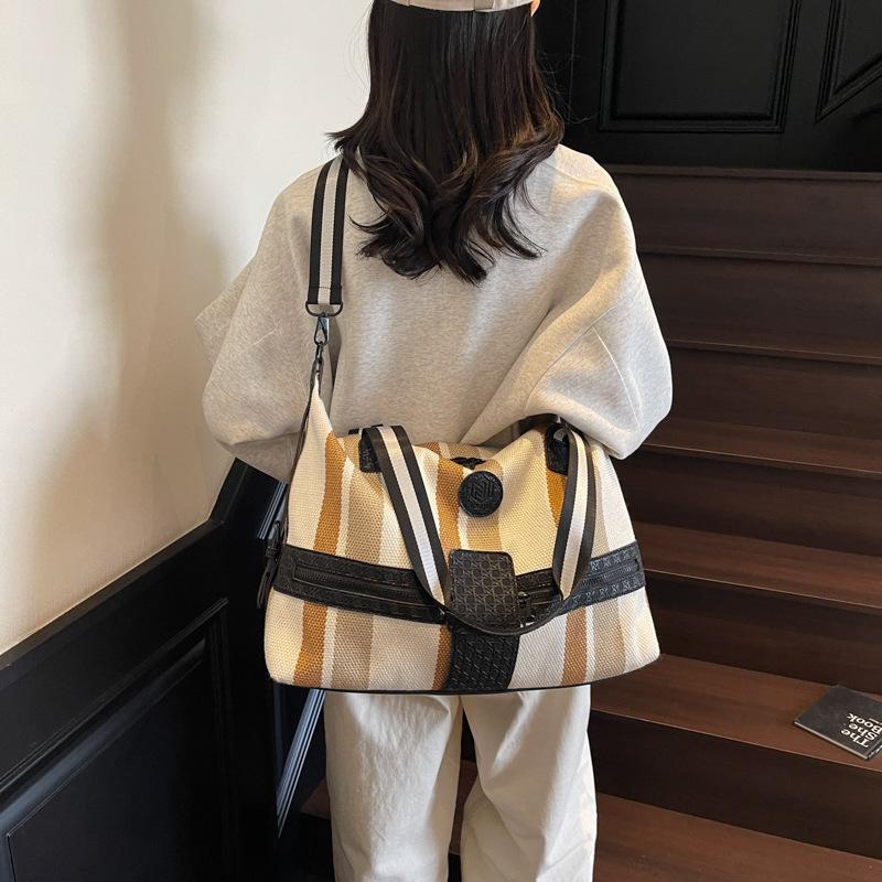 Large capacity striped travel bag, short commute, hand carry, shoulder oblique span fitness bag, simple storage travel bag