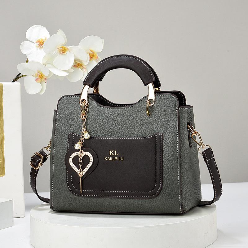 New Women's Versatile Handbag Summer Large Tote Bag Fashion Exquisite Pendant Women's Bag  New Single Shoulder Crossbody Bag