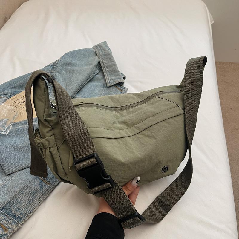 Korean version of casual nylon canvas bag women's 2025 new simple dumpling bag versatile shoulder messenger bag