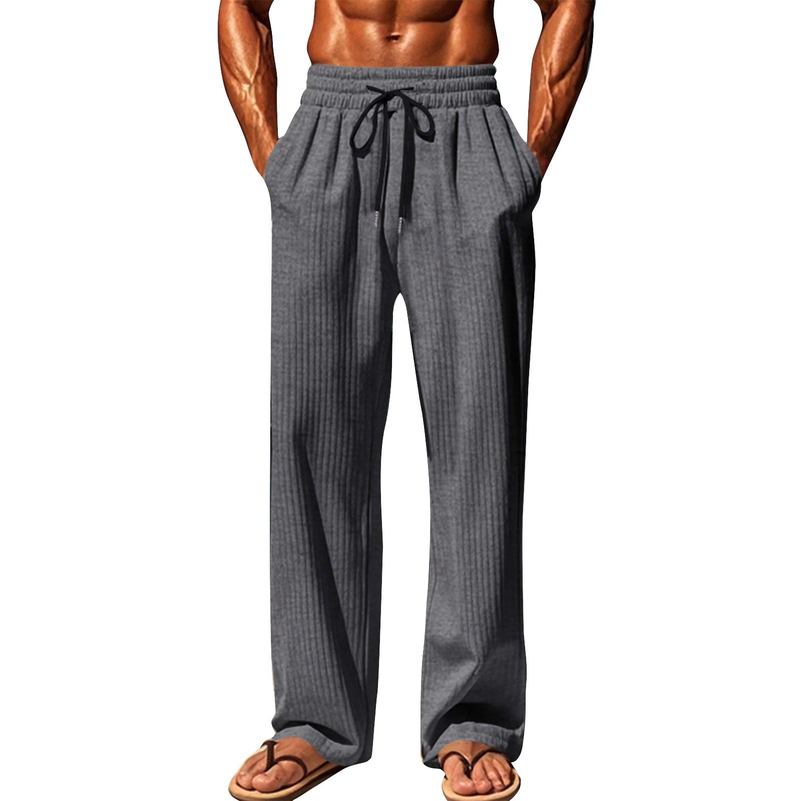 

Чоловічі однотонні спортивні штани з вертикальною смужкою на кулісці L