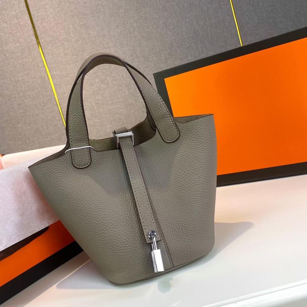 Hochwertige halbhandgefertigte Gemüsekorbtasche togo erste Schicht Rindsleder Pendlertasche echtes Leder tragbare Beuteltasche Damen 18cm