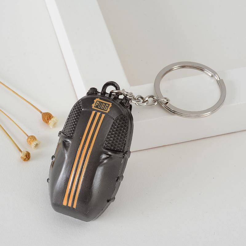 

«Хит продаж: игрушечная металлическая модель автомобиля и брелок для выживания»