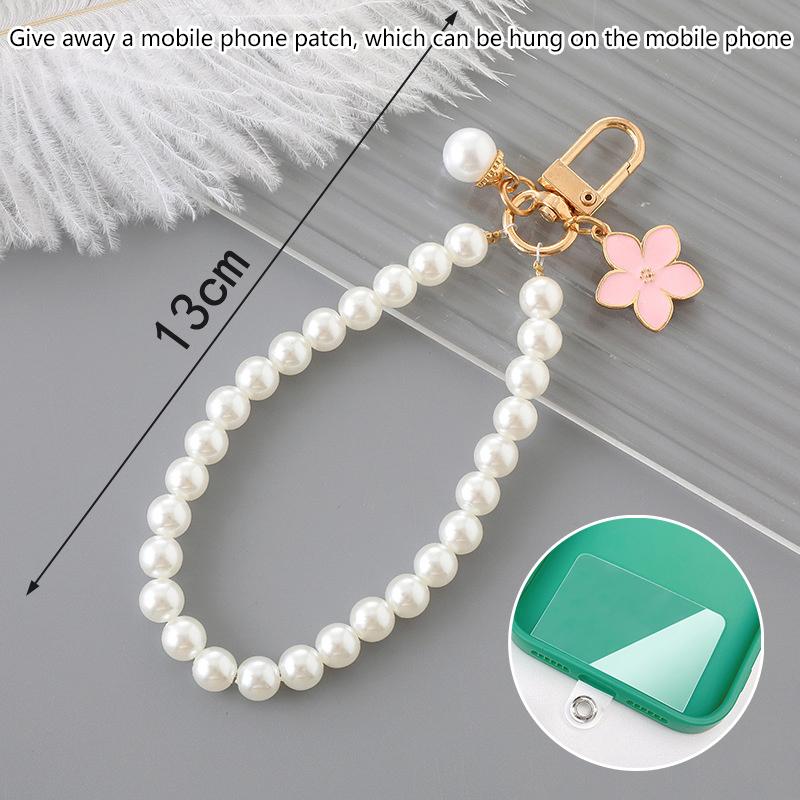 

Жемчужный бусина цветок бант телефон цепочка брелок брелок сумка подвеска веревка для iPhone Android мобильное устройство женщины леди