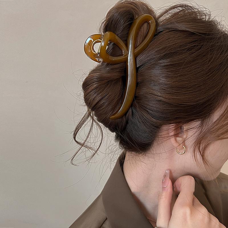 Pince à cheveux géométrique creuse couleur unie coréenne pour femmes Pince à cheveux simple Épingles à cheveux Grande pince crabe Accessoires pour cheveux Coiffure