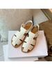 Sheepskin version~ thick-soled woven sandals women's summer one-word buckle belt hollow breathable pig cage shoes flat Roman shoes