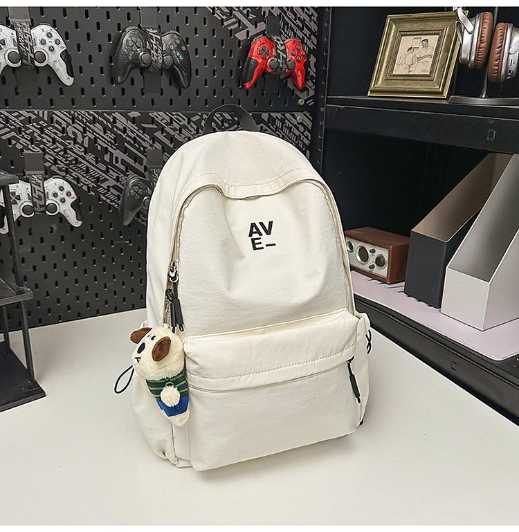School bag Korean version couple simple large-capacity backpack leisure commuting college student school bag niche light travel backpack