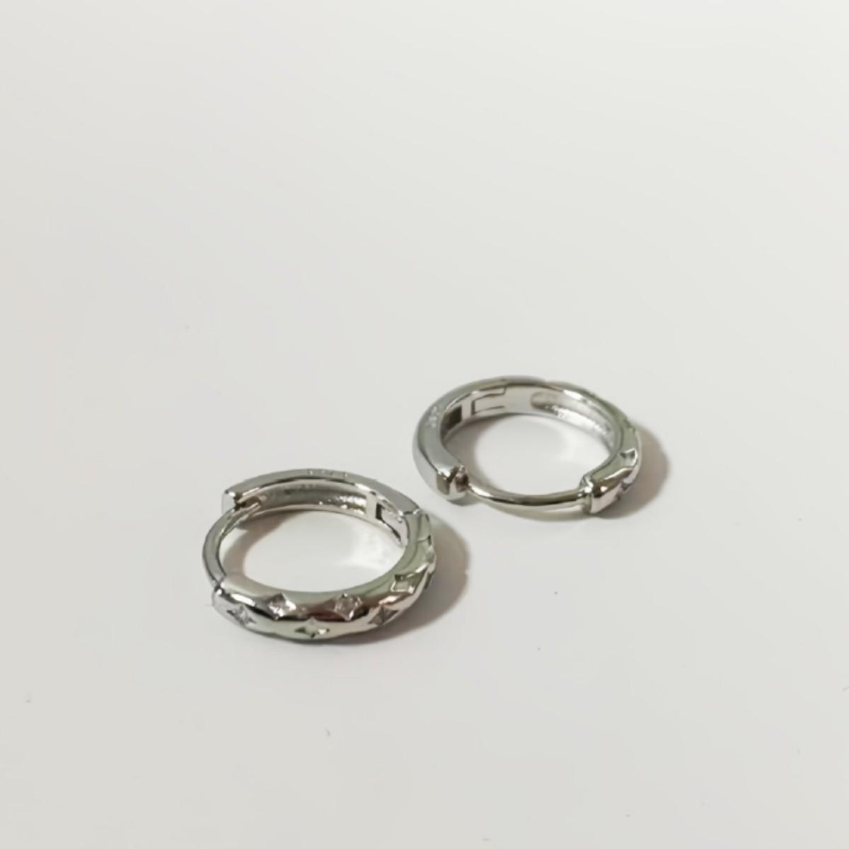 Fashionable Four-Pointed Star Zirconia Stud Earrings - Elegant European and American Style for Women.