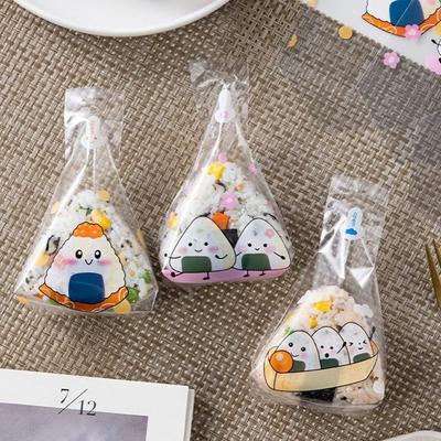 50 Stück Transparente Reisbällchen-Verpackungstasche Einweg-Lebensmittelqualität Sushi-Tasche Cartoon-Muster Dreieckstasche Lebensmittelverpackung