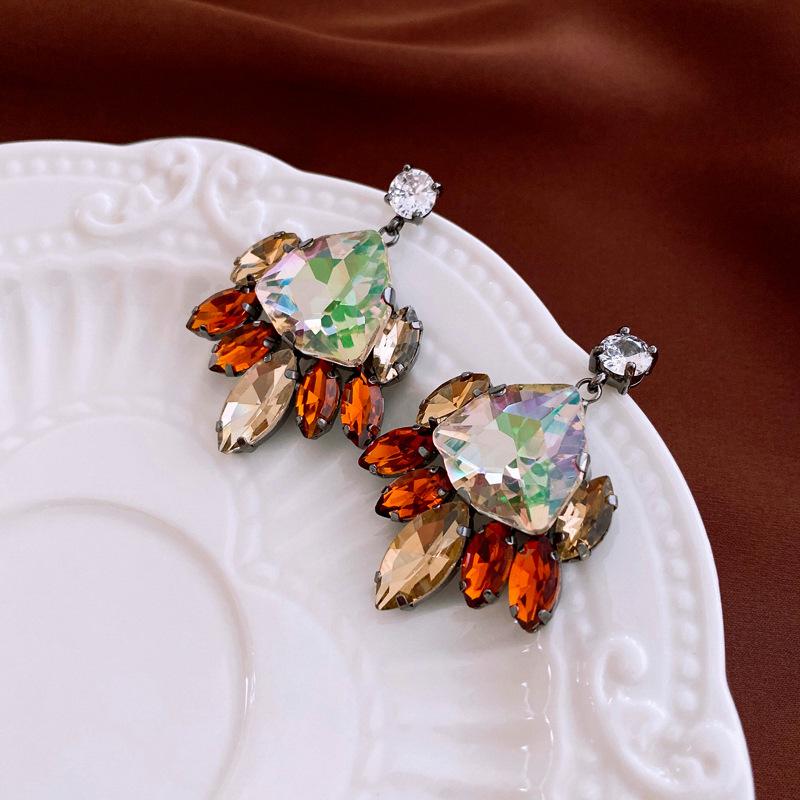 

Елегантні ретро сережки з китицями з діамантів та цирконію