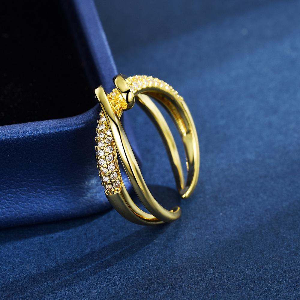 Geometric Criss-Cross Wrap Ring: Women's Elegant Cold-Style Design.
