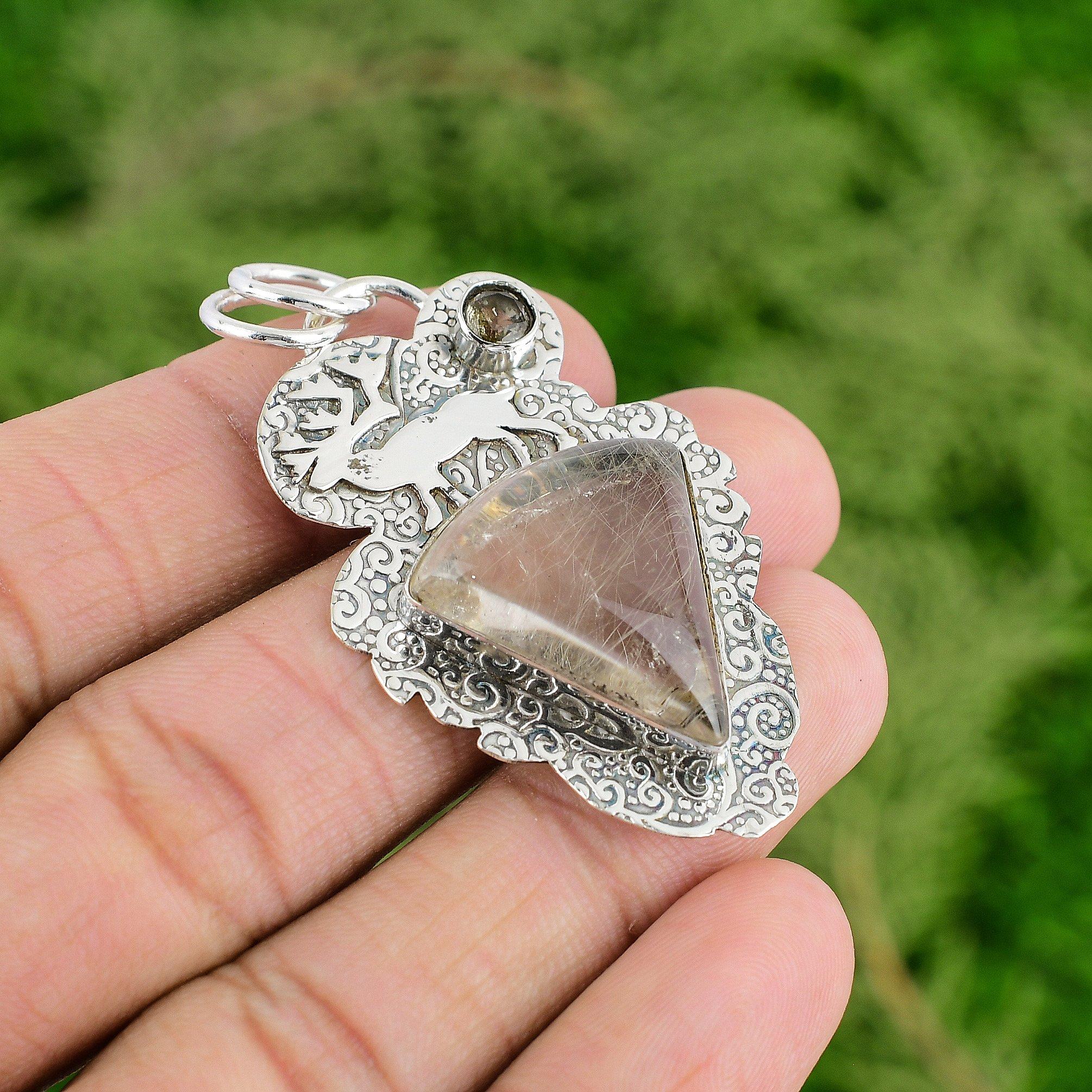 

Подвеска из стерлингового серебра с натуральным золотистым рутиловым дымчатым кварцем в безеле, этническое ювелирное изделие