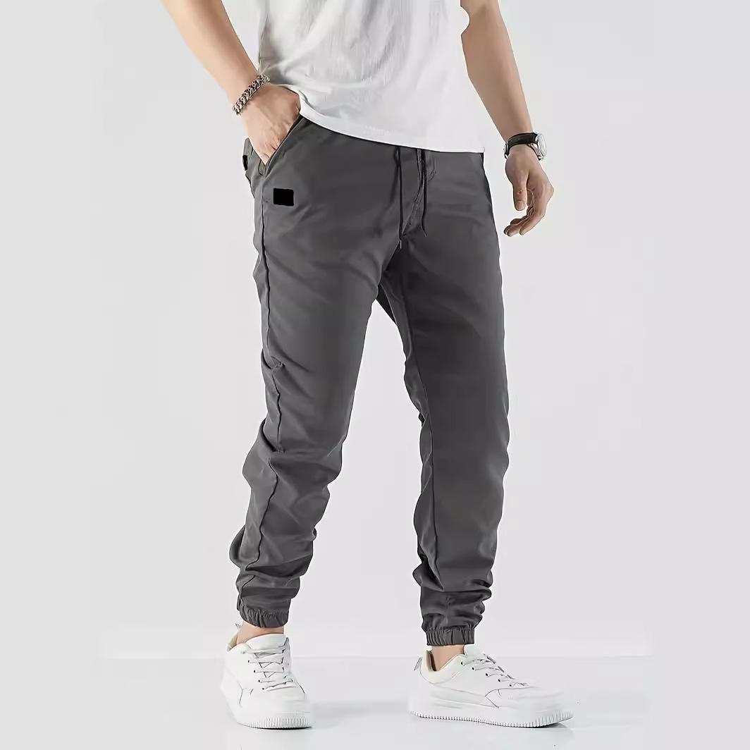 

Four Seasons New Slim Casual Trousers Simple Leisure Pure Colour Spell Leather Trousers Micro Elastic Youth Popular Trousers M