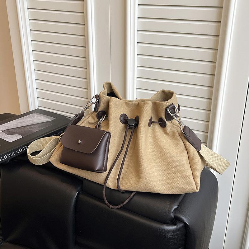 Canvas bag women's large-capacity new autumn and winter drawstring shoulder messenger bag premium pleated bucket bag