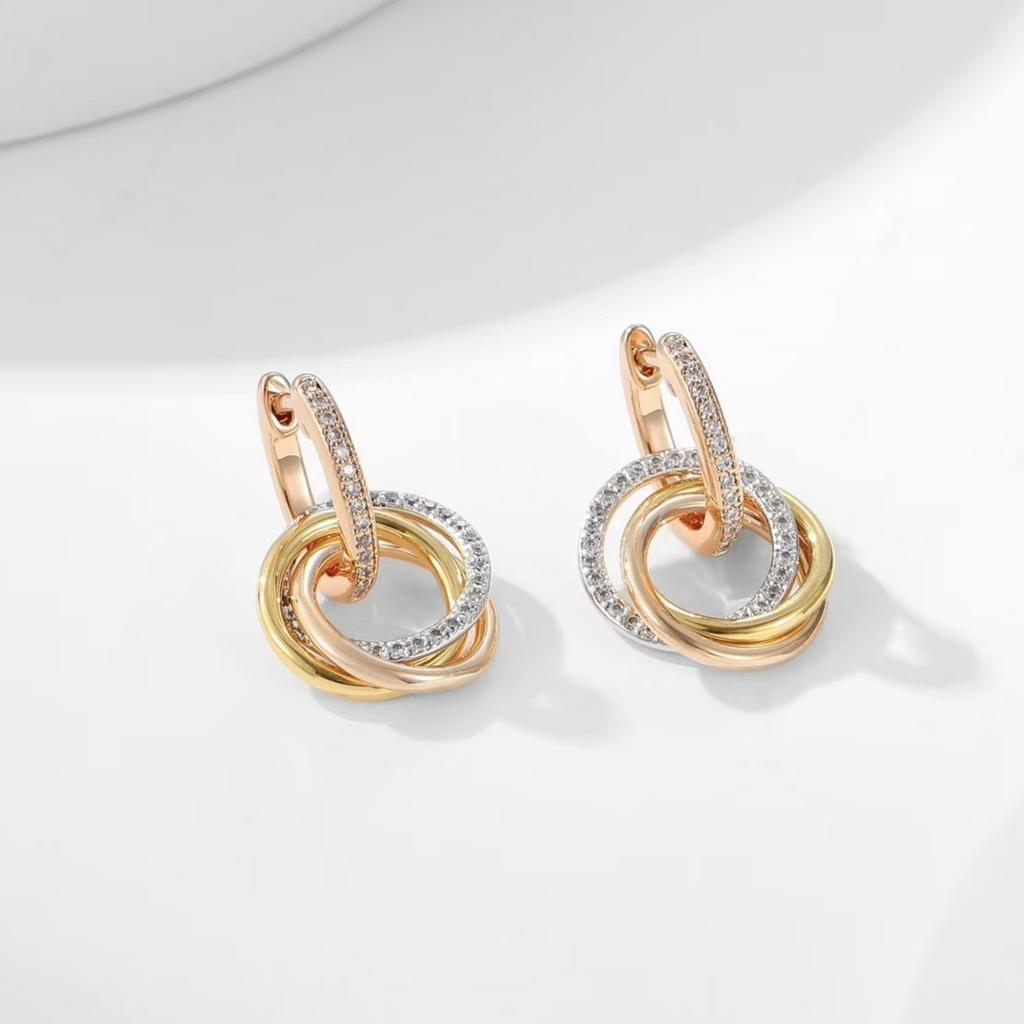 Boucles d'oreilles trois couleurs à trois anneaux serties de diamants, plaquées or 18 carats, usinées CNC, avec clous en diamants Seiko Light Luxury