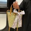 Pastoral simple niche casual straw woven handbag women's 2025 new fashion versatile vacation style messenger bag