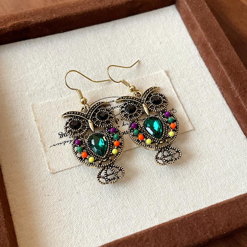 

Diamond-encrusted owl hollow water drop ear hook European and American unique high-end earrings light luxury fashion temperament earrings