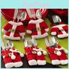 Cheerful Christmas Table Accessories With Colorful Fabric Cutlery Covers And Seasonal Attire