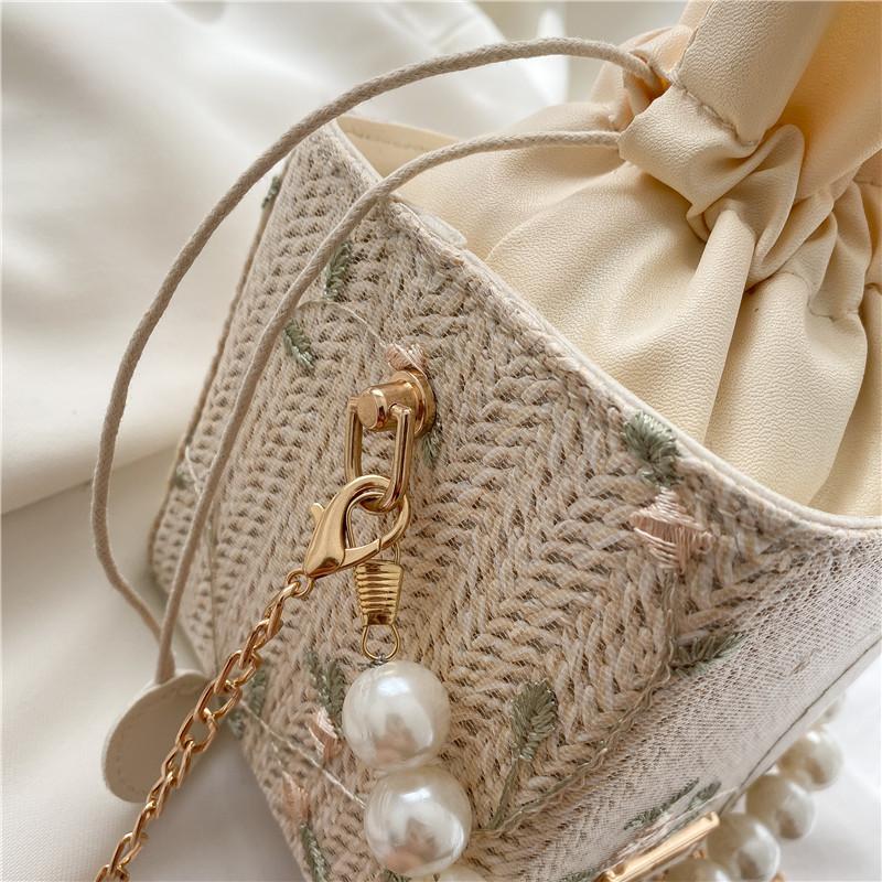 Pearl handbag women's 2025 new trendy small square bag fashion chain shoulder bag summer Internet celebrity woven bucket bag