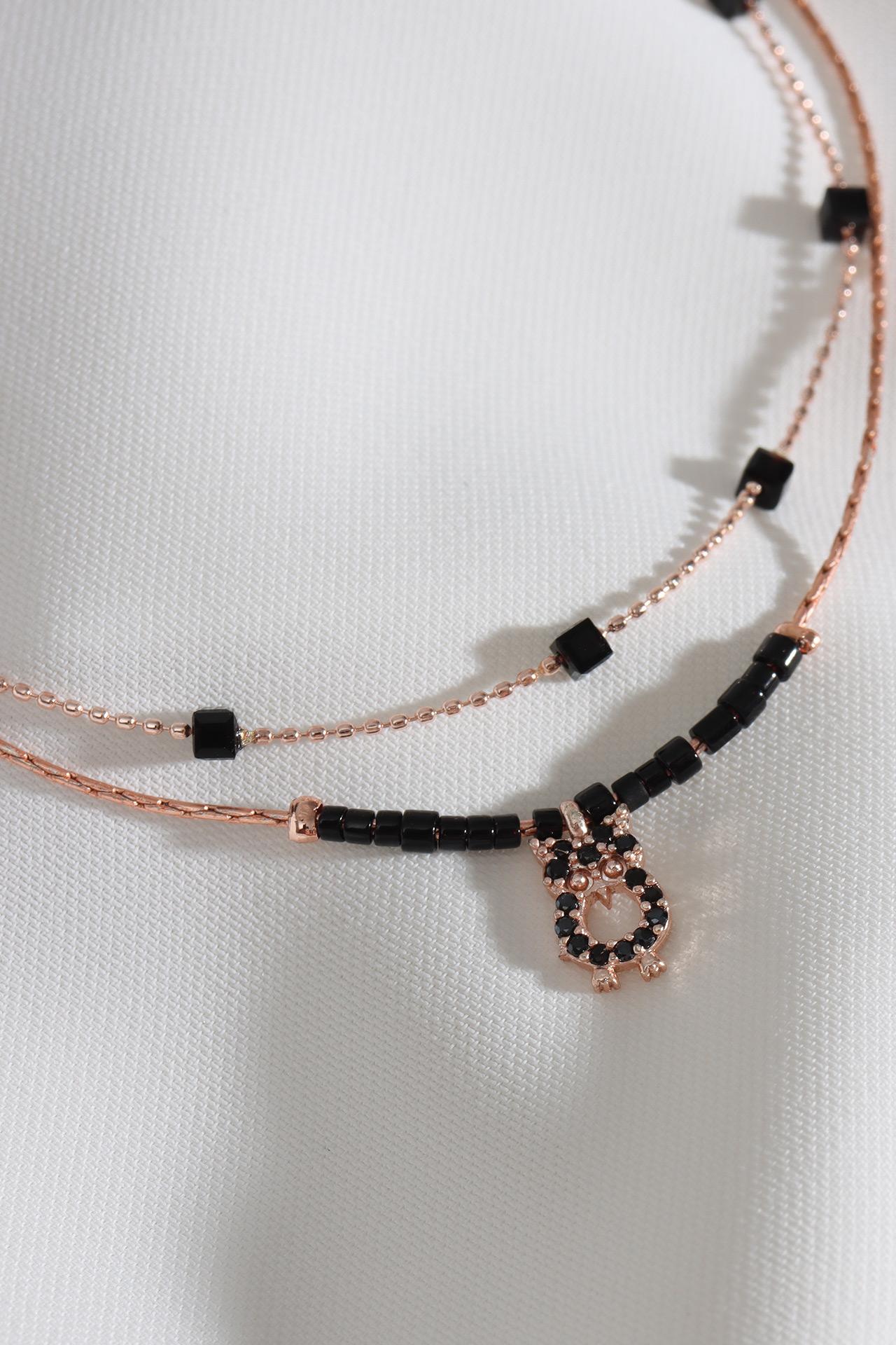 

Браслет в виде розы с подвеской в ​​виде совы