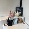 Niche casual vegetable basket bag women's new solid color bucket bag simple hand bag shoulder messenger bag