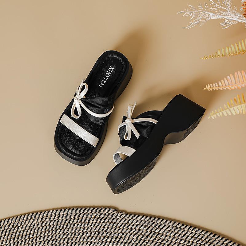

Thick-soled one-word slippers female summer new fairy middle heel muffin outer wear niche design toe bow sandals 40 чёрный