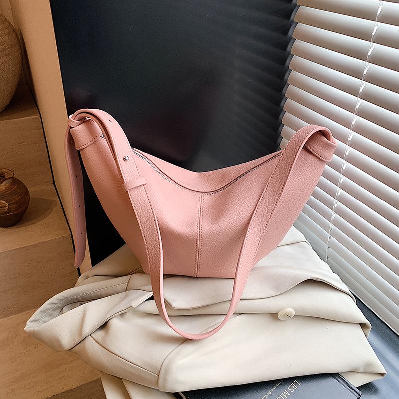 

Нишевая дизайнерская сумка женская 2025 новая подмышечная сумка-круассан модная универсальная одноплечевая кроссбоди сумка-пельмень розовый