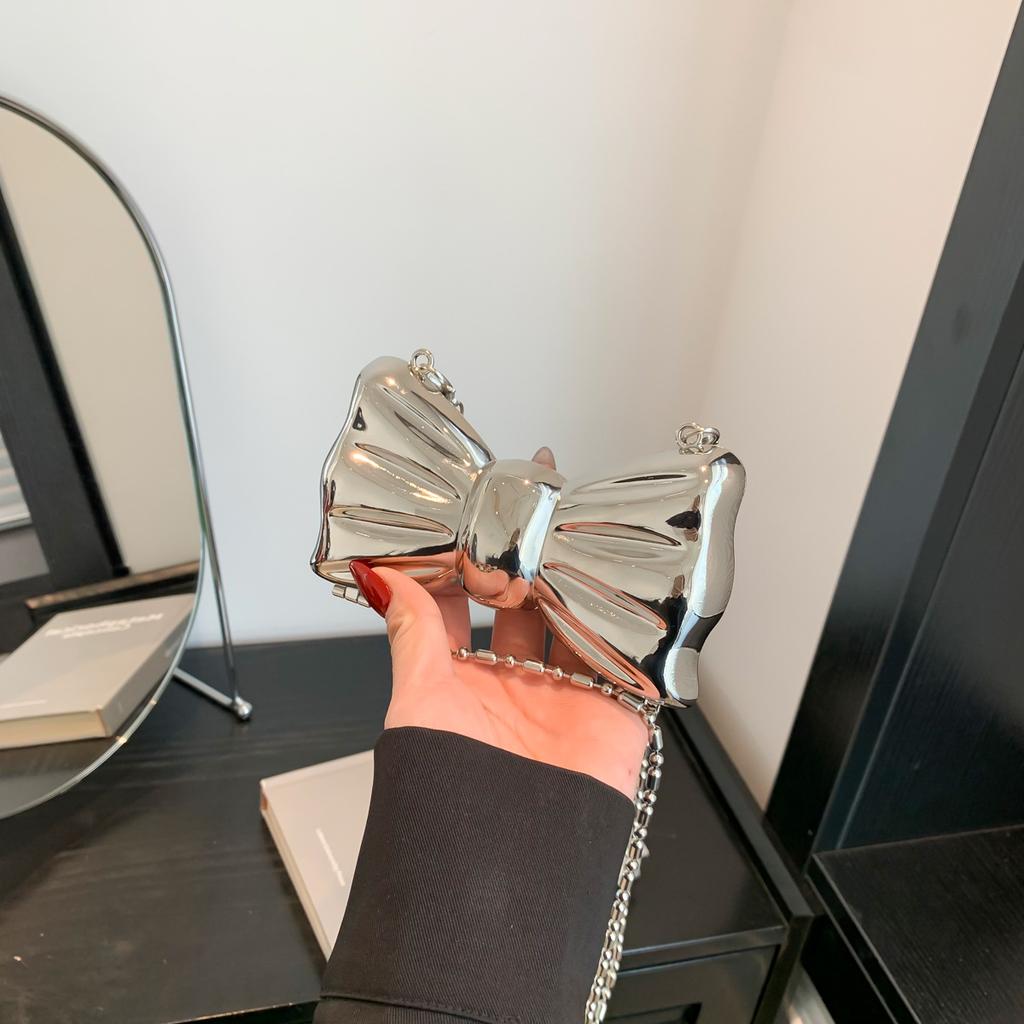 Metal mini small bag women 2025 new European and American fashion bow foreign style shoulder chain lipstick bag tide