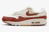 FD2370-100 Nike WMNS Air Max 1 Rugged Orange and Sail