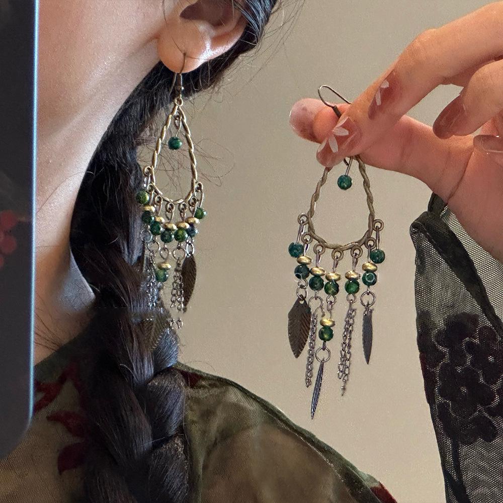 Retro Ethnic Bell Tassel Earrings: Exquisite, Fashionable Dangle Design with Light Luxury Appeal.