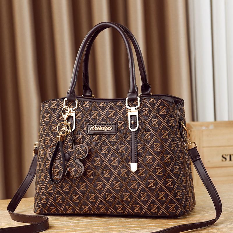 

Women s bags and women s handbags, new high-end large-capacity women s bags, mother bags, one shoulder messenger bag. Length 32 height 23 thickness 13