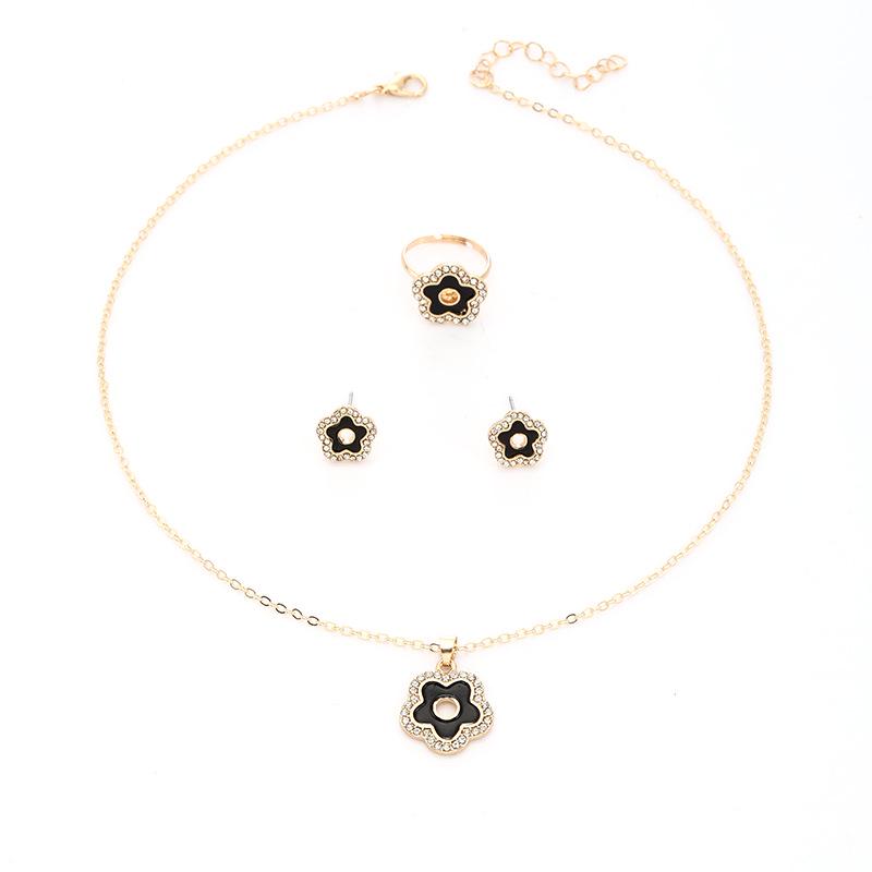 Women's Cold Style Jewelry Set: Diamond-Studded, Oil-Dripped Five-Leaf Clover & Hollow Star Necklace, Ring, Earrings