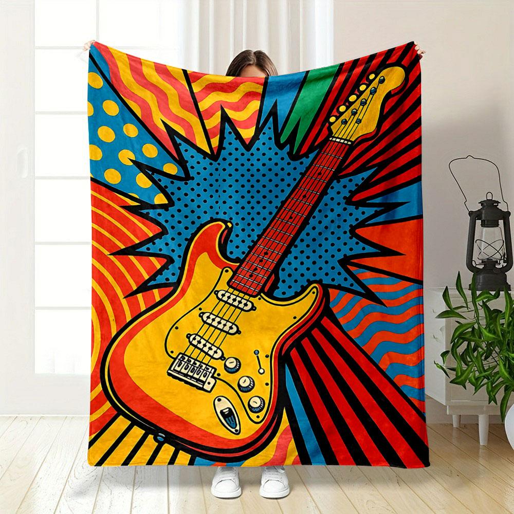 Pop art guitar surrounded by bold patterns, polka dots, and vibrant waves. for all seasons blanket lunch break throw gift