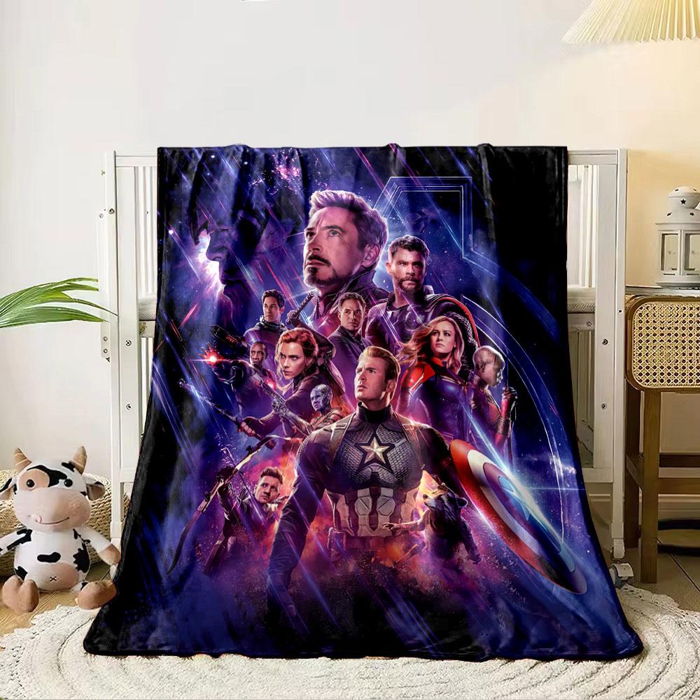 The pattern depicts a group of heroic figures with dynamic cosmic visuals. for all seasons blanket lunch break throw gift 80cm x 120cm