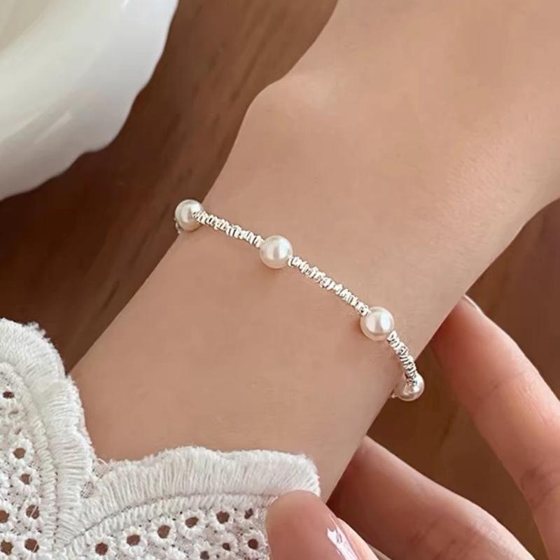 Sterling Silver Pearl Bracelet for Women: Elegant French Retro Design, Minimalist & Versatile.