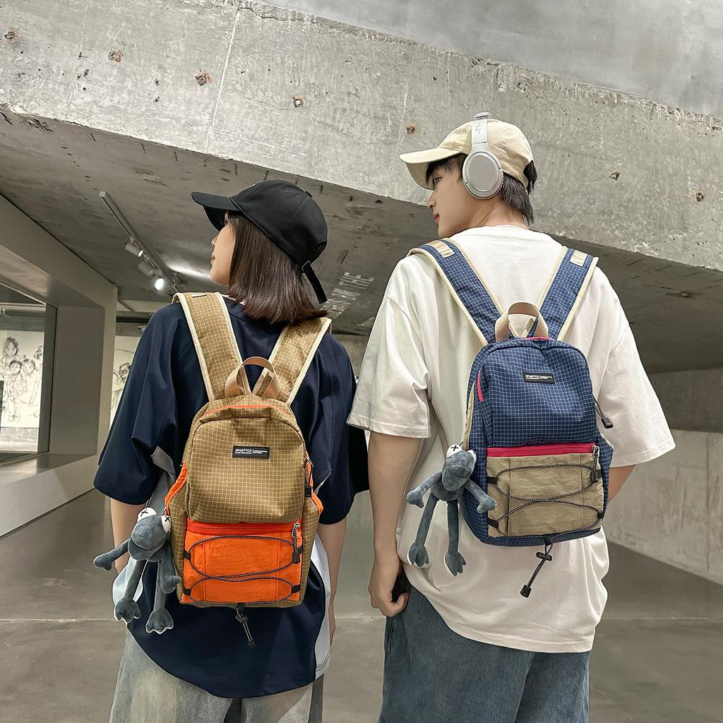Schoolbag1011 new high-value contrasting color splicing backpack bag, male and female students schoolbag, outdoor travel backpack, large capacity