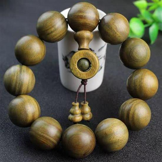 Herren Armband aus rotem Sandelholz mit goldenem Stern Agarholz Buddhistische Gebetsperlen