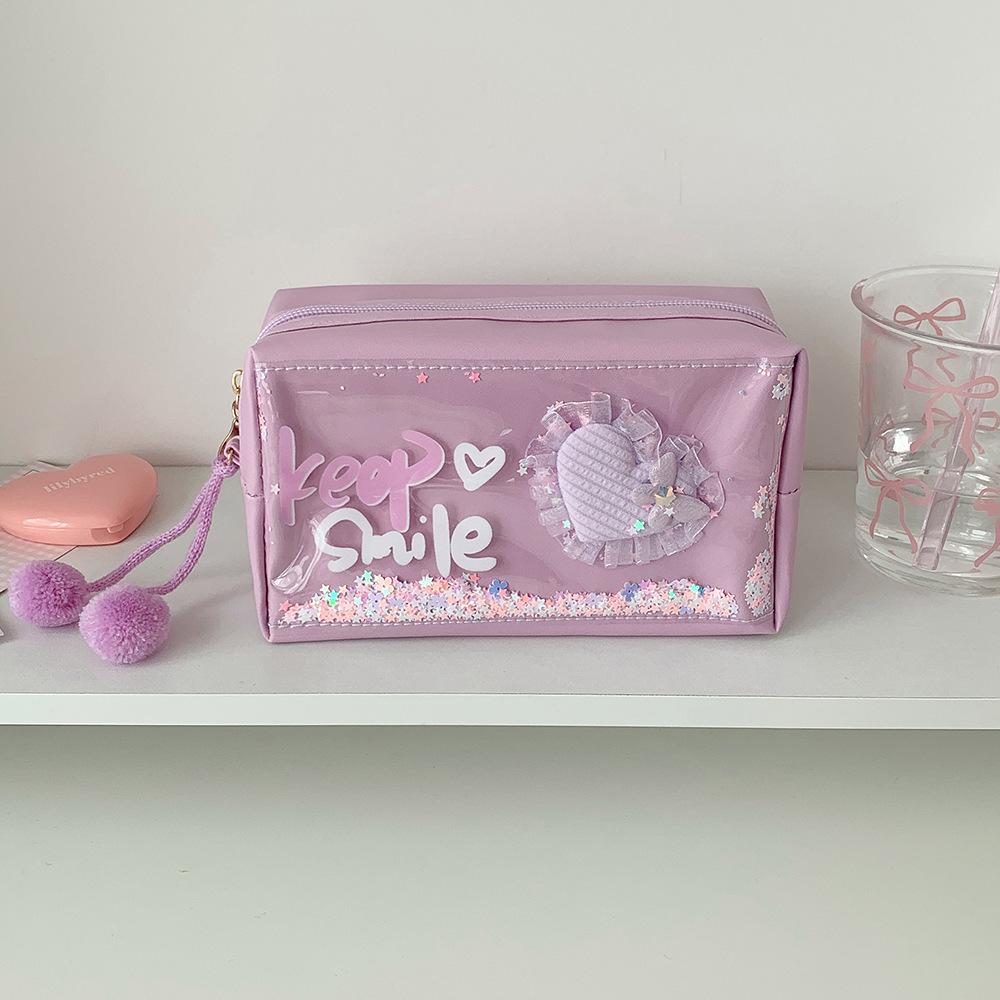 

Creative Love Flowing Sand Pencil Bag, Student Large Capacity Stationery Storage, Pencil Bag, Portable Makeup Bag світло-фіолетового кольору