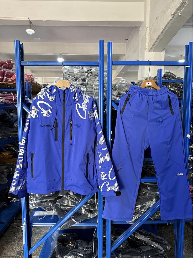 Set Giacca Antivento Riflettente Corteiz Alcatraz & Pantaloni Lunghi Casual