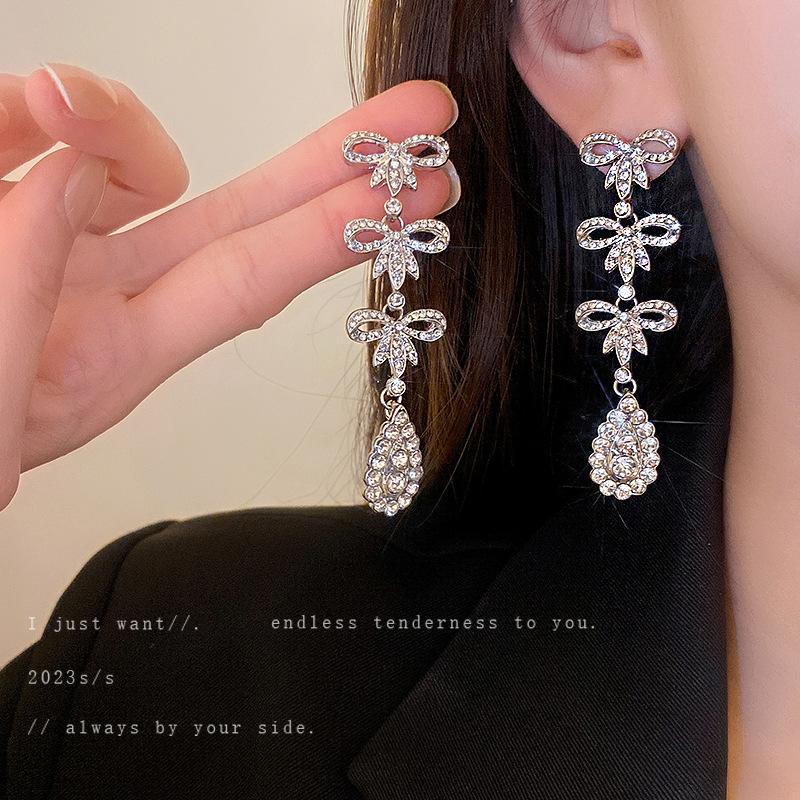 European and American Exaggerated Diamond-encrusted Flower Bow Fringed Earrings Personalized Earrings Internet Celebrity Temperament Earrings