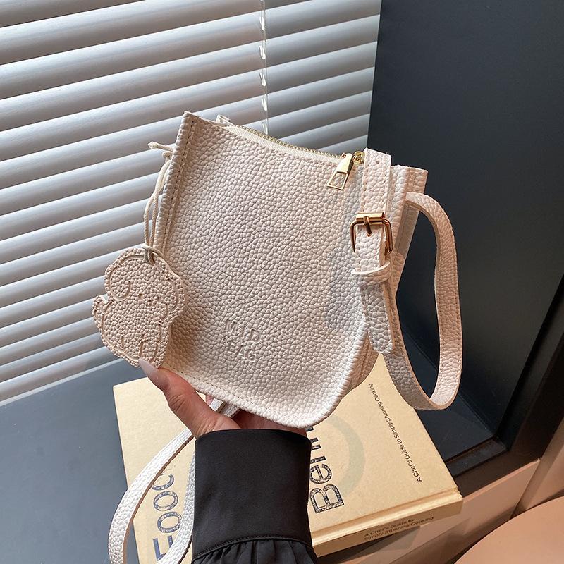 Korean version of simple vegetable basket bag women's 2025 spring and summer new fashionable versatile high-end sense portable shoulder messenger bag