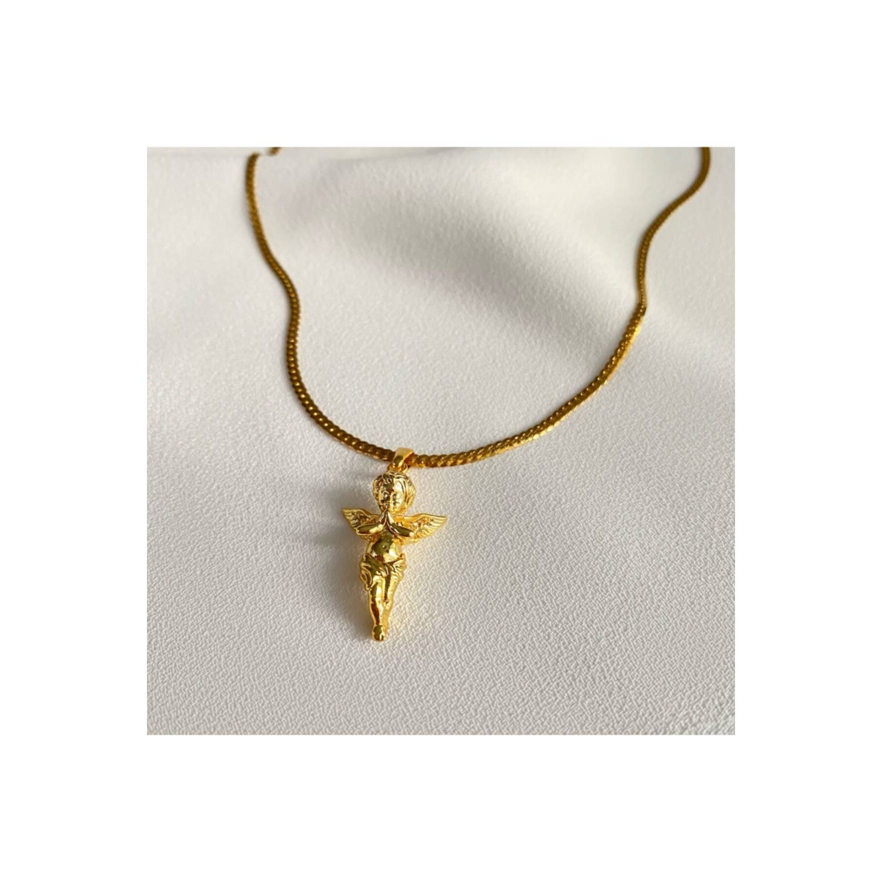 

Женское золотое ожерелье с ангелом