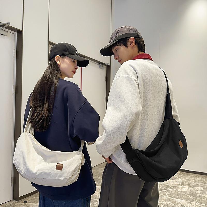 Bags niche lazy wind messenger bags women's casual versatile commuter shoulder bags men's class travel canvas bags